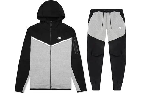 Felpa e pantalone Nike Sportswear Tech grigio scuro nero .